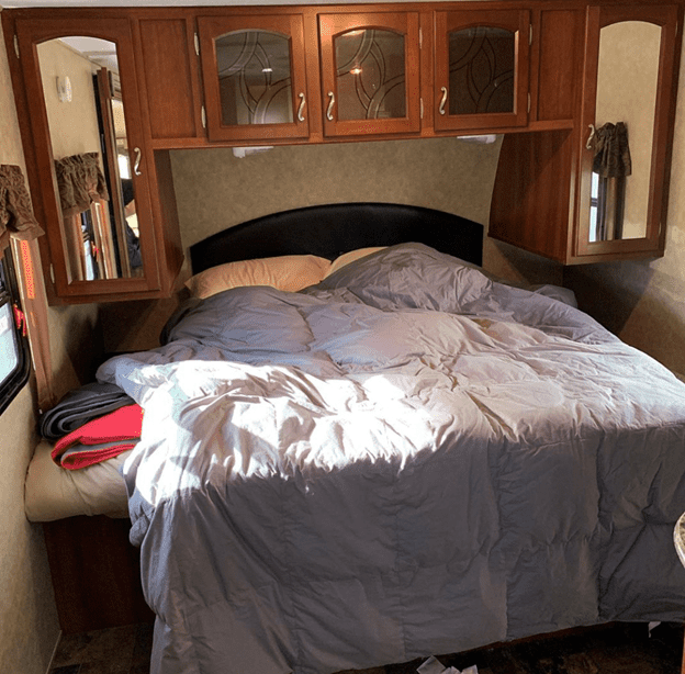 Leah's original RV bedroom at @heads.east.tails.west
