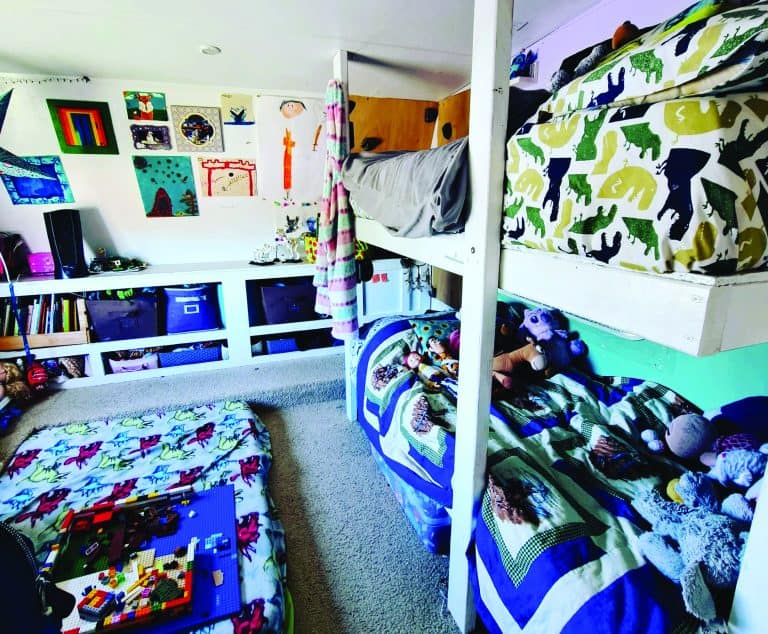@Ontheroamagain built colorful RV bunk beds for a playful kids' room